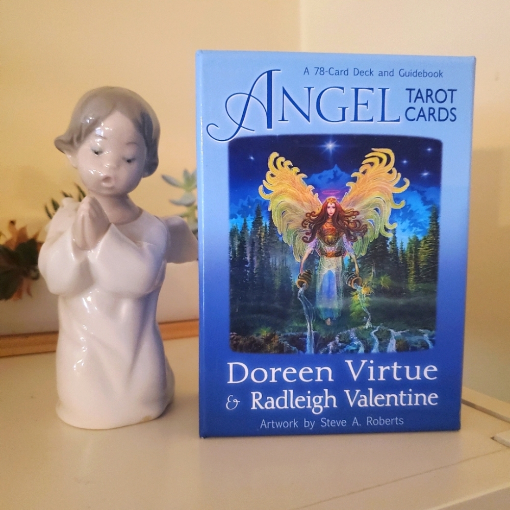 Lladro praying angel figurine with Doreen Virtue Angel cards